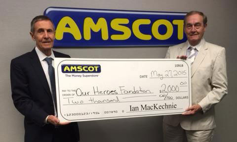 Ian MacKechnie presenting check to Heroes Foundation
